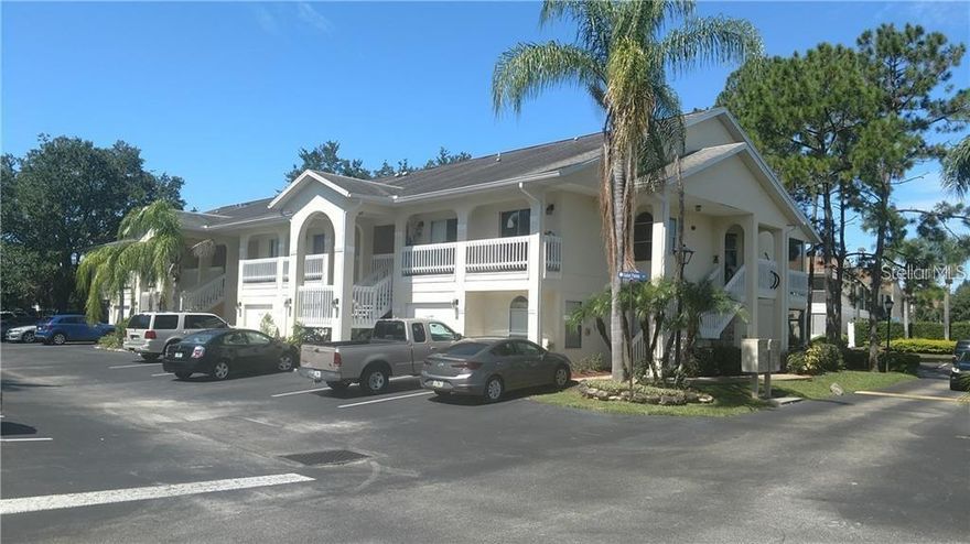 GRAND PALMS Community featuring well maintained 2 bedroom - 2 bath Second floor unit. Kitchen with dinette area.  Open floor plan for living and dining.   New luxury vinyl throughout.  Laundry closet includes stackable washer/dryer. Private screened rear patio.  One reserved parking space.  Convenient location minutes away from Celebration, Disney, major highways, shopping and dining.  NO PETS.
Call today for private showing.