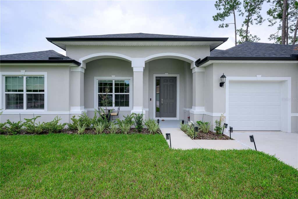 Photo of 25 Edge Lane, Palm Coast, FL 32164 (MLS # FC320478)