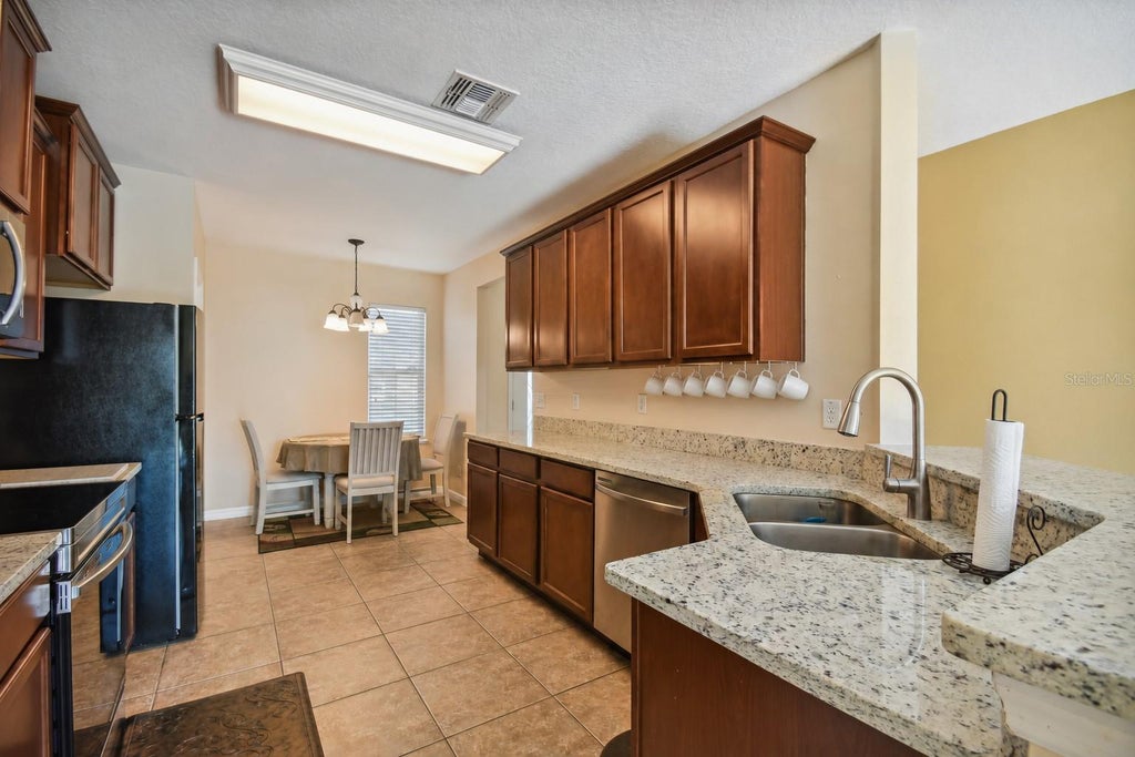 Photo of 1814 Stargazer Trail, Kissimmee, FL 34758 (MLS # O6444214)