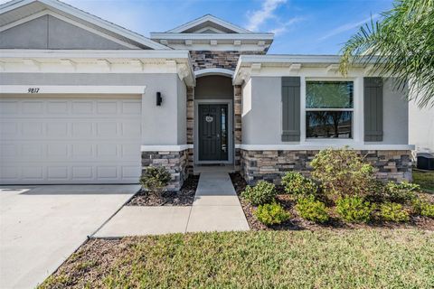 Photo of 9817 Rowing Dale Bend, Wesley Chapel, FL 33545 (MLS # TB8448326)