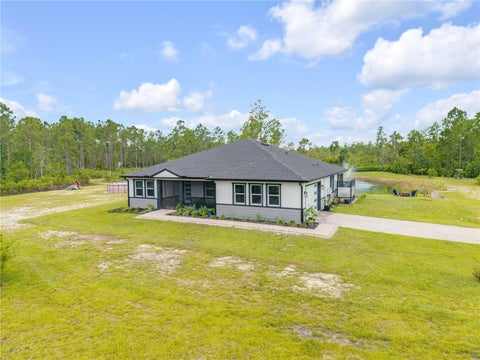 Photo of 300 Omega Ranch Road, New Smyrna Beach, FL 32168 (MLS # NS1088668)