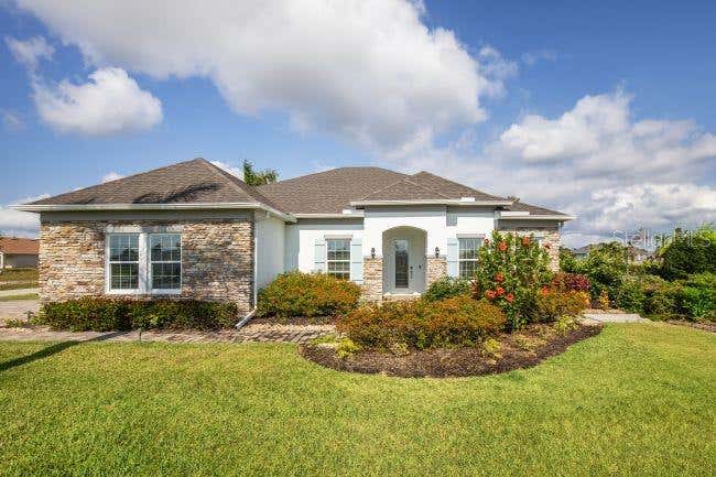Photo of 10384 Laura Avenue E, Brooksville, FL 34614 (MLS # J1003339)