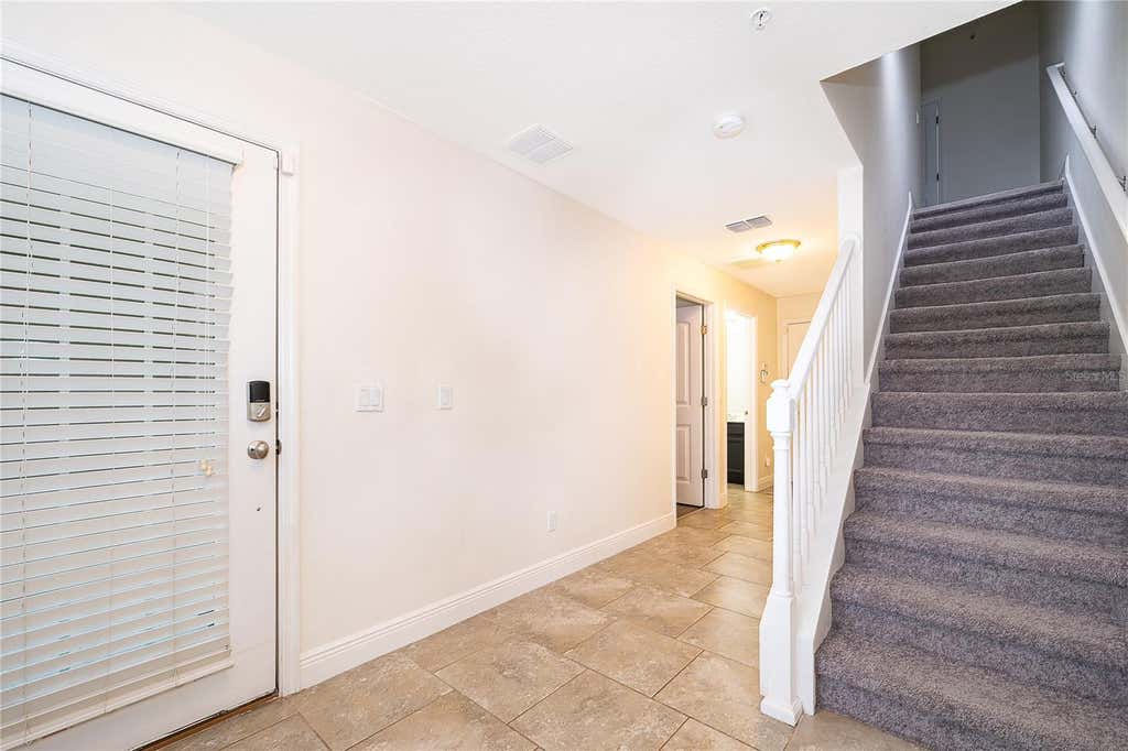 Photo of 10061 Town Lake Drive, Orlando, FL 32832 (MLS # O6432963)