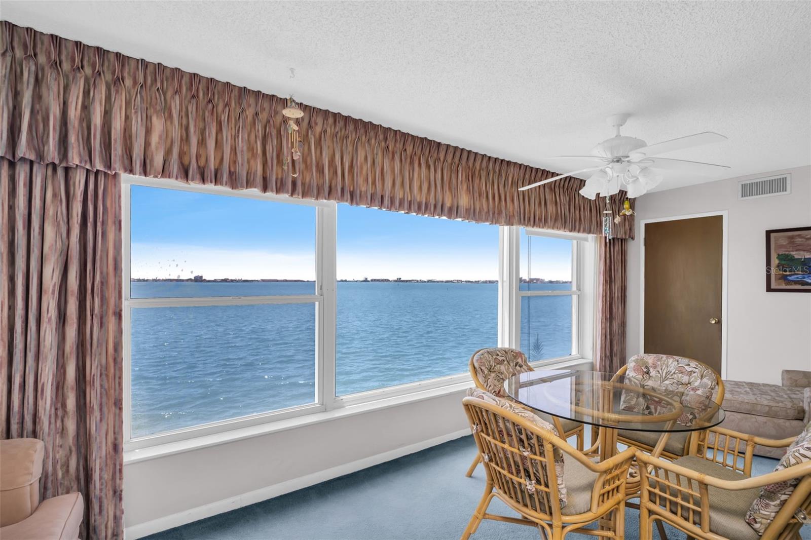 Back on the market due to no fault of the sellers- Clean 4-point in hand- Wake up to sweeping water views and the shimmering silhouette of the iconic Don Cesar Hotel in this beautifully appointed 4th-floor residence, located in the highly coveted Diplomat Building of Town Shores—a premier 55+ waterfront community in the heart of Gulfport. This light-filled 2-bedroom, 2-bath condo offers a split floor plan for added privacy and comfort, and is being sold fully furnished—all you need to bring is your toothbrush. Recently refreshed with freshly shampooed carpets and furniture, the home is ready for immediate enjoyment. The spacious primary suite features a walk-in closet and ensuite bath, while the kitchen comes equipped with a gas range—ideal for the inspired home chef. Enjoy peace of mind with laundry located just steps from your door and a designated covered parking space included for added convenience. The Town Shores community offers an unmatched lifestyle with multiple sparkling pools, tennis courts, pickleball, bocce ball, shuffleboard, and an active social scene. Just outside your door, Gulfport awaits with its charming shops, dining, beachfront, parks, and year-round events. Whether you're seeking a seasonal escape or a full-time residence, this is coastal living at its finest—luxurious, effortless, and undeniably Gulfport. Gas furnace (2014).
