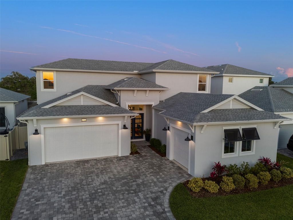 Photo of 8720 Drummer Plank Drive, Wesley Chapel, FL 33545 (MLS # TB8368642)