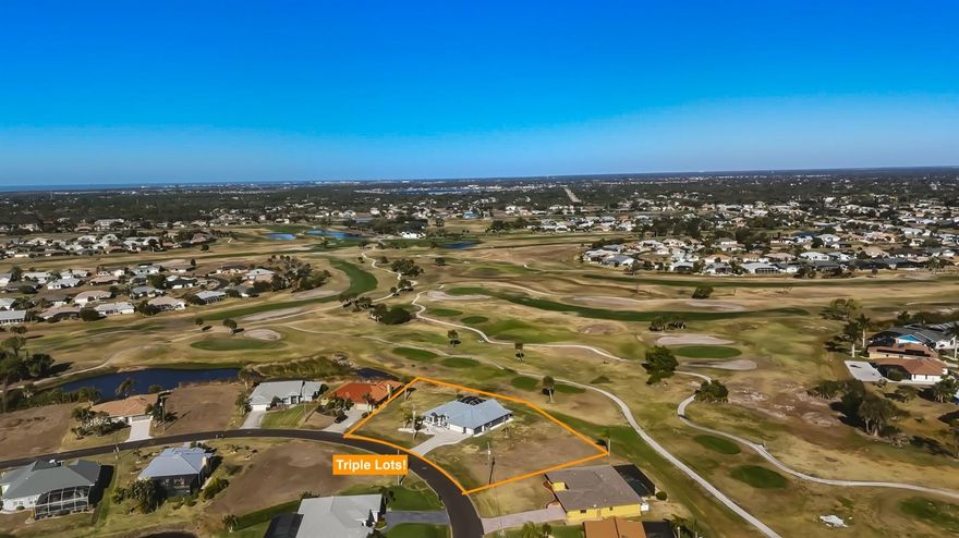 TURN-KEY, FULLY FURNISHED. IMPECCABLY REMODELED WITH DESIGNER FINISHES. X FLOOD ZONE. SITUATED ON THREE LOTS! GOLF COURSE VIEWS. A MUST SEE! From the moment you arrive, this exceptional Rotonda West home stands apart. Completely upgraded and thoughtfully remodeled, this 3-Bedroom, 2-Bath, 3-Car Garage residence offers the rare combination of modern luxury, peace of mind, and space — all set on an expansive Triple-Lot homesite overlooking the Palms Golf Course.

Designed for effortless Florida living, the open-concept layout is filled with natural light and framed by Impact-Rated Sliders that open to a stunning outdoor retreat. Enjoy a SALTWATER POOL, oversized screened lanai with grilling area, and sweeping GOLF COURSE VIEWS — perfect for entertaining or unwinding in total privacy. Inside, the home features a beautifully updated kitchen with newer appliances, custom cabinetry, stunning granite countertops, pantry and eat-in dining space perfect for entertaining. The open, split bedroom floor plan provides plenty of space and privacy for you and your family and guests with truly stunning upgraded bathrooms, gorgeous tile flooring, fresh interior and exterior paint, and tasteful furnishings and upgraded lighting fixtures throughout — truly move-in ready!

Major improvements provide long-term value and confidence, including a 24-Gauge Standing Seam METAL ROOF, IMPACT WINDOWS AND DOORS, NEW A/C, WHOLE-HOUSE REPIPE, TANKLESS WATER HEATER, ATTIC FOAM INSULATION, REINFORCED SOFFITS, NEW GUTTERS, and a WHOLE-HOME SURGE PROTECTOR. The oversized 3-car garage is a standout with epoxy floors, insulated impact garage doors, built-in cabinetry, utility sink, and generous storage! This home spares no expense when it comes to quality, craftsmanship, and modern improvements.

Located in X FLOOZ ZONE and nestled within the deed-restricted community of Rotonda West — known for its five golf courses, parks, and tranquil setting — this home is just minutes from Boca Grande, Manasota Key beaches, boating, dining, and shopping. With three combined lots totaling approximately 0.66 ACRES, there’s ample room to add a detached garage, store toys, or simply enjoy extra space and privacy.

This is not just a home — it’s a fully upgraded Florida lifestyle, ready for you to unpack and start enjoying from day one. Give us a call and schedule your must see showing, today!