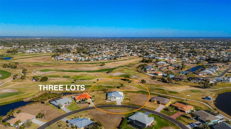 TURN-KEY, FULLY FURNISHED. IMPECCABLY REMODELED WITH DESIGNER FINISHES. X FLOOD ZONE. SITUATED ON THREE LOTS! GOLF COURSE VIEWS. A MUST SEE! From the moment you arrive, this exceptional Rotonda West home stands apart. Completely upgraded and thoughtfully remodeled, this 3-Bedroom, 2-Bath, 3-Car Garage residence offers the rare combination of modern luxury, peace of mind, and space — all set on an expansive Triple-Lot homesite overlooking the Palms Golf Course.

Designed for effortless Florida living, the open-concept layout is filled with natural light and framed by Impact-Rated Sliders that open to a stunning outdoor retreat. Enjoy a SALTWATER POOL, oversized screened lanai with grilling area, and sweeping GOLF COURSE VIEWS — perfect for entertaining or unwinding in total privacy. Inside, the home features a beautifully updated kitchen with newer appliances, custom cabinetry, stunning granite countertops, pantry and eat-in dining space perfect for entertaining. The open, split bedroom floor plan provides plenty of space and privacy for you and your family and guests with truly stunning upgraded bathrooms, gorgeous tile flooring, fresh interior and exterior paint, and tasteful furnishings and upgraded lighting fixtures throughout — truly move-in ready!

Major improvements provide long-term value and confidence, including a 24-Gauge Standing Seam METAL ROOF, IMPACT WINDOWS AND DOORS, NEW A/C, WHOLE-HOUSE REPIPE, TANKLESS WATER HEATER, ATTIC FOAM INSULATION, REINFORCED SOFFITS, NEW GUTTERS, and a WHOLE-HOME SURGE PROTECTOR. The oversized 3-car garage is a standout with epoxy floors, insulated impact garage doors, built-in cabinetry, utility sink, and generous storage! This home spares no expense when it comes to quality, craftsmanship, and modern improvements.

Located in X FLOOZ ZONE and nestled within the deed-restricted community of Rotonda West — known for its five golf courses, parks, and tranquil setting — this home is just minutes from Boca Grande, Manasota Key beaches, boating, dining, and shopping. With three combined lots totaling approximately 0.66 ACRES, there’s ample room to add a detached garage, store toys, or simply enjoy extra space and privacy.

This is not just a home — it’s a fully upgraded Florida lifestyle, ready for you to unpack and start enjoying from day one. Give us a call and schedule your must see showing, today!