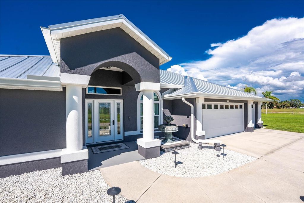 Photo of 20 Bunker Terrace, Rotonda West, FL 33947 (MLS # D6146001)