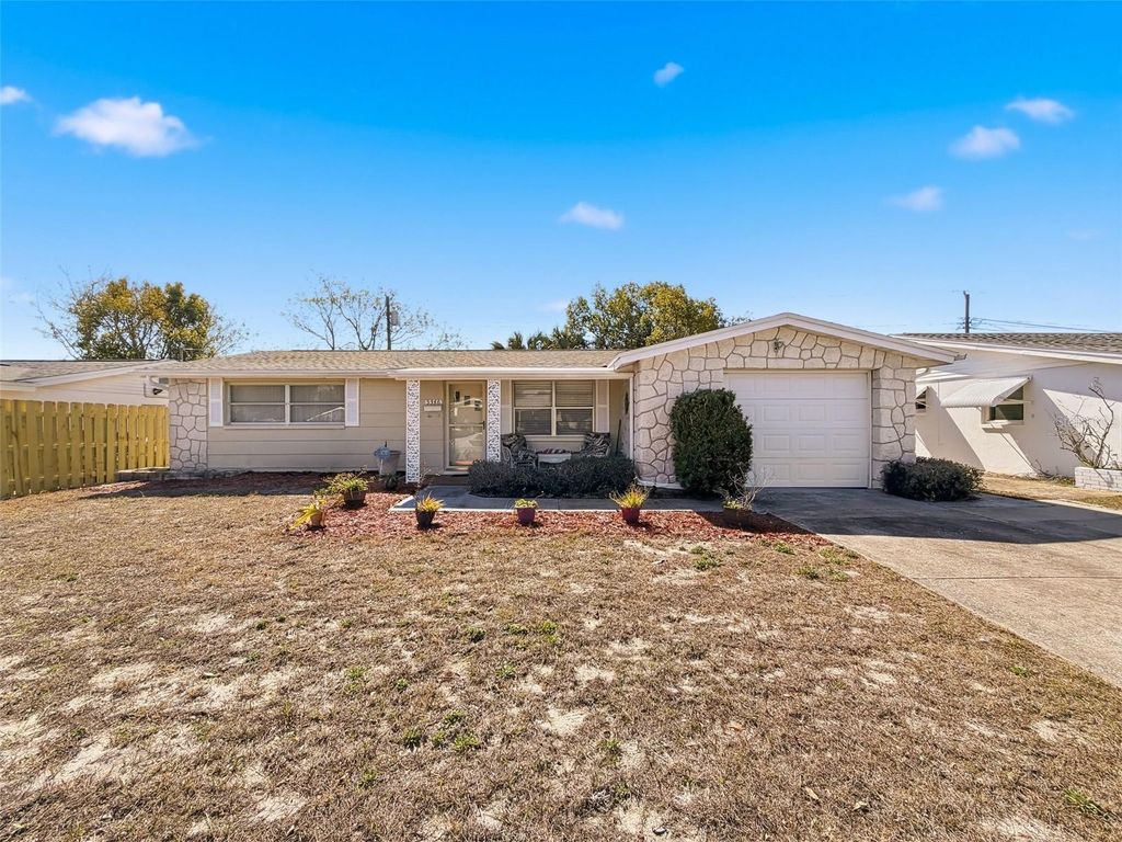 Photo of 5346 Mosaic Drive, Holiday, FL 34690 (MLS # O6383093)