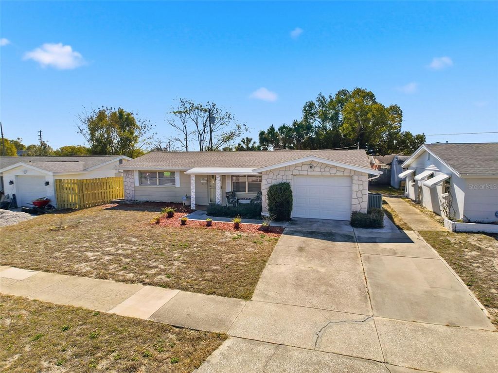 Photo of 5346 Mosaic Drive, Holiday, FL 34690 (MLS # O6383093)