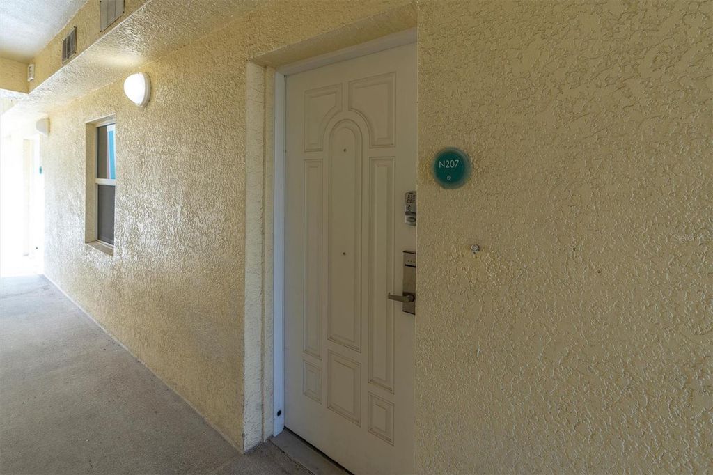 Photo of 12000 Gulf Boulevard #207N, Treasure Island, FL 33706 (MLS # TB8455124)