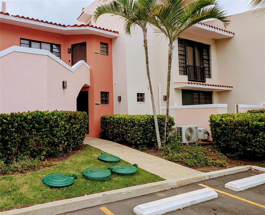 Escape to this spacious, two-level retreat nestled within the lush beauty of Palmas del Mar Beach Resort. This thoughtfully designed unit accommodates up to six people and features an open-concept layout that seamlessly blends the kitchen and living room—perfect for gathering and entertaining. Step out onto the expansive terrace and take in panoramic views of the lagoon and golf course—your private backdrop for morning coffee or evening cocktails. This unit is currently listed as short term rental during the high season, it's fully furnished and move-in ready. Short Term Rentals is allowed of one month minimum.