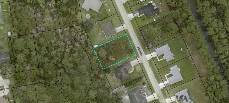 Located in Seminole Woods, this regular size lot backs up to a reserved parcel for added privacy. Located only 4.8 miles to Advent Health Hospital, and 5.3 miles to Flagler Palm Coast High School, shopping, restaurants,  and only 8.5 miles to Flagler Beach where you may enjoy  the Atlantic Beaches. Quick access to Interstate -95 for easy commute North to historic Saint Augustine- 36 miles- or South to Daytona Beach is only 22 miles. Do not miss this opportunity.