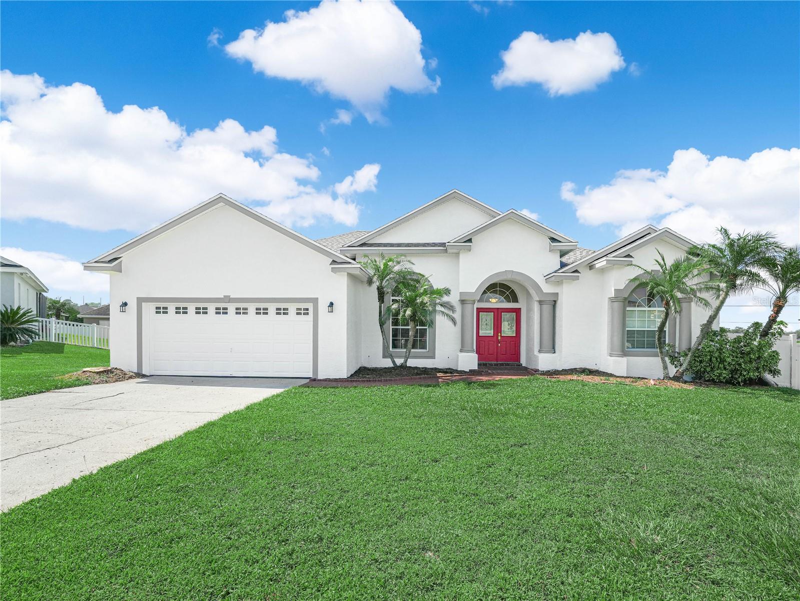 Elegant Home in Gate Vintage View Subdivision-Approximately 2,400 square feet of living space awaits in this four-bedroom, three-bathroom house on a spacious 0.28-acre fenced lot. The inviting entryway leads into formal/dining living room. BRAND NEW ROOF AND HOT WATER HEATER.
The open layout features BRAND NEW TILE floors, complemented by abundant natural light that floods the living spaces. Elegant arches and architectural details add charming character, while the spacious kitchen boasts ample cabinetry, granite countertops, and stainless steel appliances (BRAND NEW Range and Dishwasher). Tile flooring in the kitchen provides a durable and easy-to-maintain surface.
The four bedrooms, including the primary bedroom, laminate floors, ceiling fans, and elegant finishes, creating a serene and comfortable retreat. The main bedroom has double closets, sinks, garden tub, separate walk in shower and water closet. Private entry to lanai with sliding glass doors.
The three way bedroom split, offers privacy. The guest bedroom and separate bath has private lanai entry with third split for privacy. The second and third bedrooms share 2nd bathroom.
Stepping outside, a covered patio with brick flooring provides a relaxing outdoor living space, while the spacious lot allows for ample room for recreation or expansion. The home is situated within a gated community and features a brand-new roof, adding to the property's curb appeal and long-term value.
This home offers an ideal blend of space, style, and functionality, making it a wonderful choice for a variety of homebuyers.