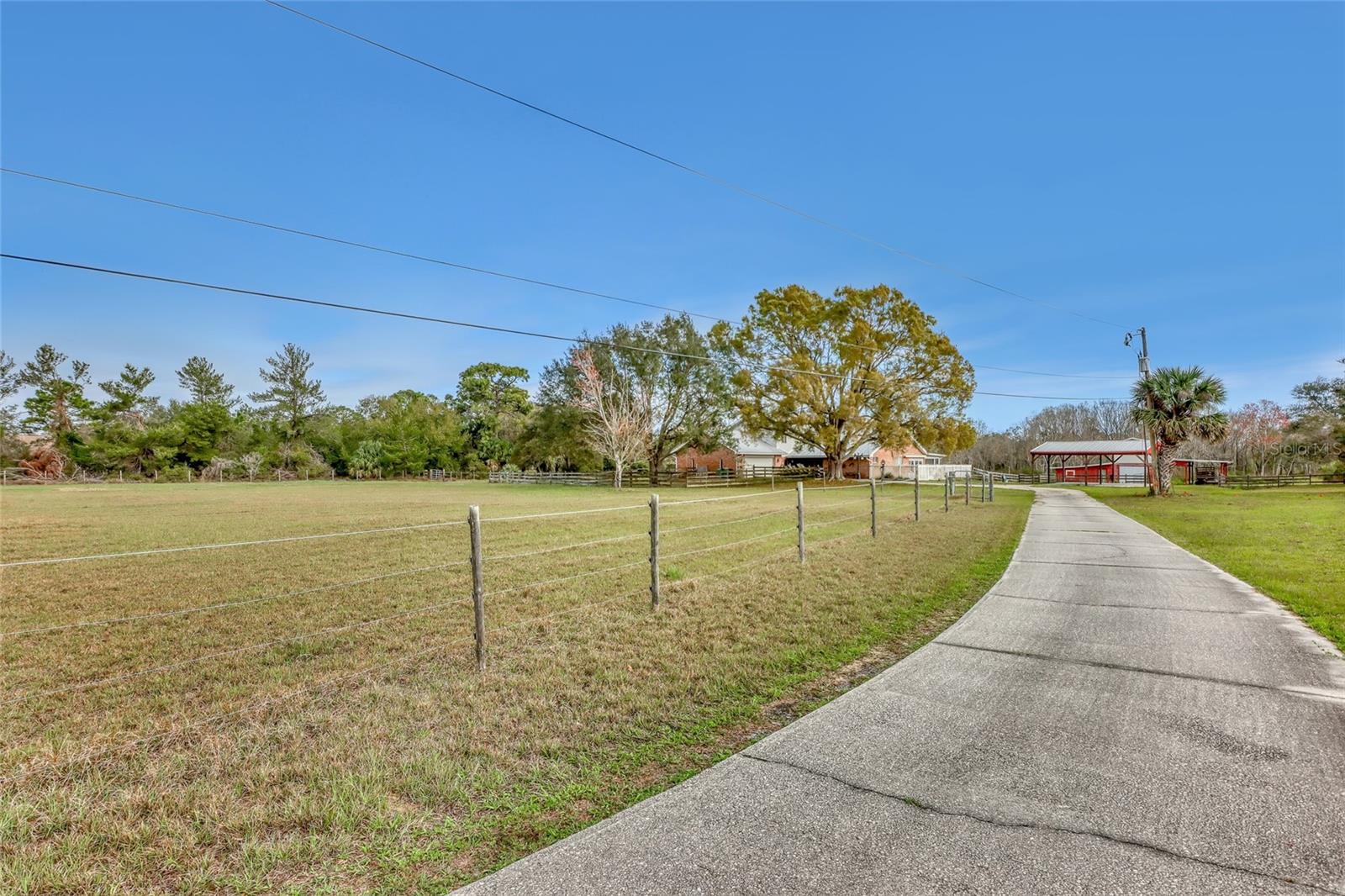Short Sale. MOTIVATED SELLER!! Welcome to your picture-perfect homestead, a sprawling 3-bedroom, 3-bathroom home offering over 3,000 square feet of living space and set on nearly 7 acres of land—an idyllic setting for making memories and endless possibilities. Whether you're looking for room to grow, space for hobbies, or a serene place to call your own, this home delivers. This large property is ready to meet any family's vision. With 7 acres at your disposal, you can create your dream landscape, bring your horses, and explore countless outdoor activities right in your own backyard. Imagine gathering around a bonfire, hosting summer barbecues, or simply enjoying the tranquility of your private land. There's truly no limit to what you can do here. The home itself is a perfect blend of comfort and functionality. Featuring two spacious master bedrooms—one conveniently located on the first floor—this home is ideal for growing families or multi-generational living. The first-floor master can also serve as a perfect in-law suite, offering privacy and convenience. Upstairs, you'll find a versatile flex room, whether you need an office, a playroom, or an additional living space, the options are endless. The sellers have lovingly cared for this home for nearly 22 years, and it's ready for its next chapter with you. Bring your personal touches, make your vision a reality, and create the home you've always dreamed of. Don't miss the chance to own a property where both your family and your imagination can truly flourish. Come see it today and begin your next adventure!