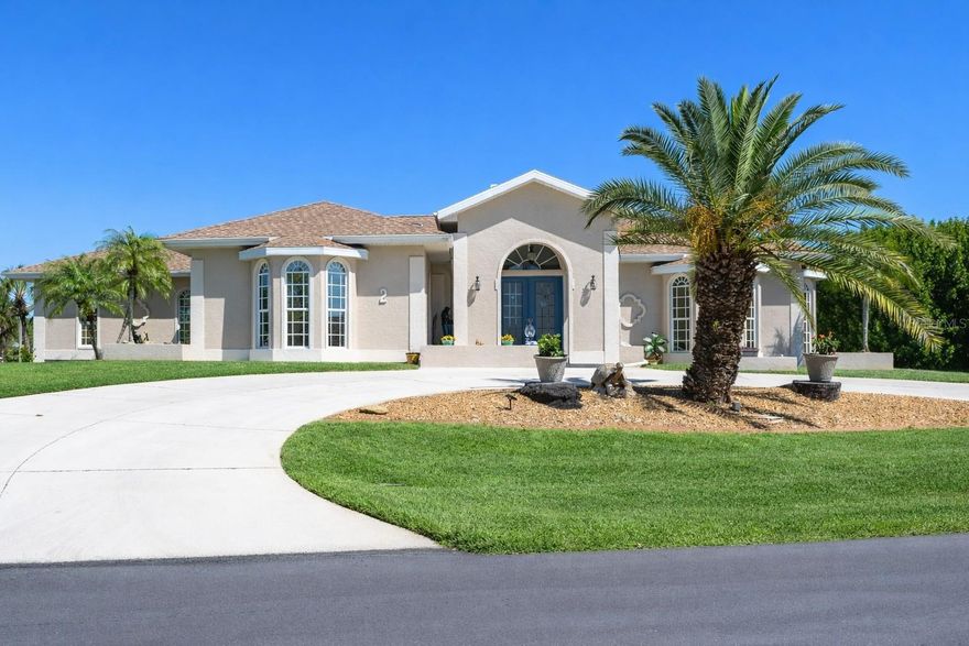 Luxury Living in Rotonda West | Rare Half-Acre Corner Estate | This a beautiful home seller says bring your offers

Absolutely stunning and thoughtfully redesigned, this oversized 3-bedroom, 2-bath, 3-car garage home sits on a rare half-acre corner lot, offering a level of space, privacy, and upgrades that is truly hard to find.

From the moment you walk in, you’ll feel it—no detail overlooked. The main living area showcases oversized sliding glass doors, creating seamless indoor-outdoor living and filling the home with natural light. A beautiful gas fireplace anchors the space, adding warmth and elegance.

The kitchen is beautifully appointed and designed for both everyday living and entertaining, featuring custom all-wood cabinetry, leather-finished granite countertops, a gas double-oven range, LG refrigerator with dual ice makers, and a custom vent hood.

Step outside to your private resort-style retreat, where an oversized in-ground spool invites you to relax and unwind year-round. The new 2024 lanai cage, upgraded lighting, and open outdoor space make this home ideal for entertaining or simply enjoying the Florida lifestyle.

This home is built for comfort and efficiency with a tankless gas hot water system and a 250-gallon underground propane tank, supporting the home’s gas features and enhancing everyday living.

The owner’s suite is a true retreat, featuring a double-door entry, custom walk-in closet, and a spa-inspired bathroom with dual vanities, lighted mirrors, and a custom tiled shower with glass enclosure and designer finishes.

Additional highlights include smart home features, whole-home surge protection, generator hookup, UV HVAC system, epoxy-coated 3-car garage, and extensive upgrades completed in 2024.

Opportunities like this are rare in Rotonda West—offering space, luxury, and functionality in one exceptional property.

This is more than a home—it’s a lifestyle upgrade. Don’t miss your opportunity to own one of the area’s most uniquely upgraded properties.