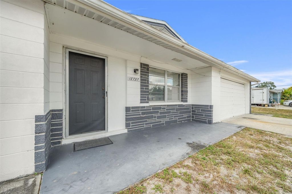 Photo of 12707 Social Drive, Hudson, FL 34667 (MLS # TB8434604)