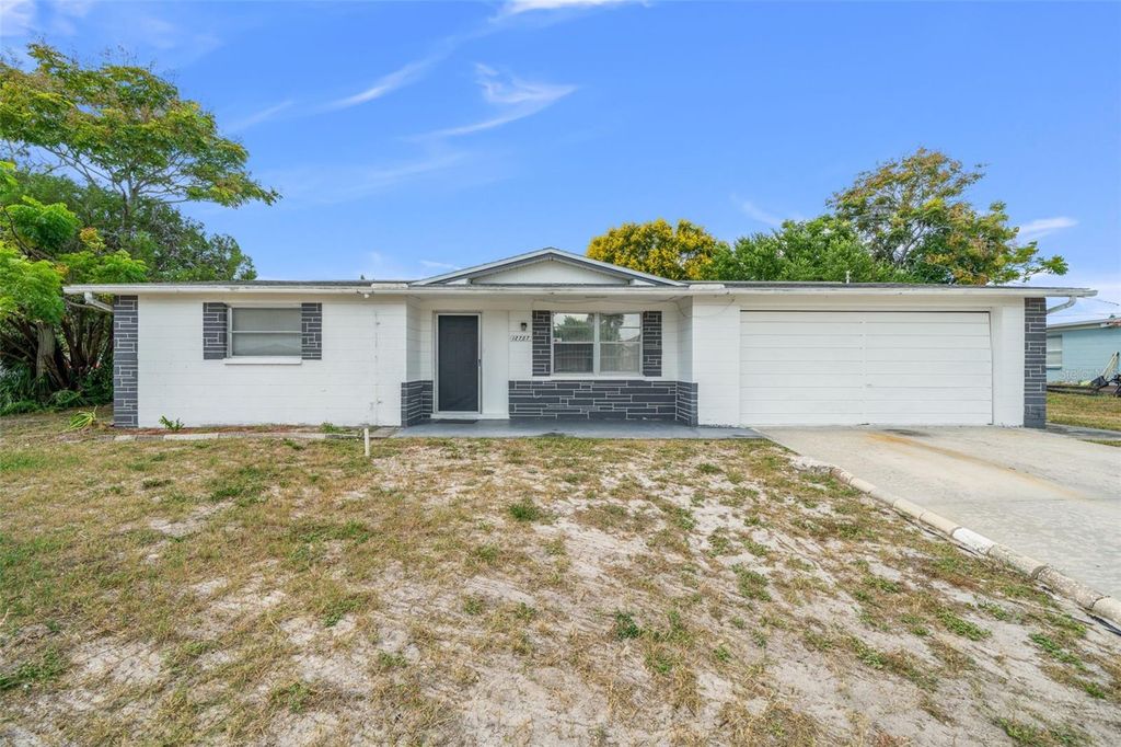Photo of 12707 Social Drive, Hudson, FL 34667 (MLS # TB8434604)