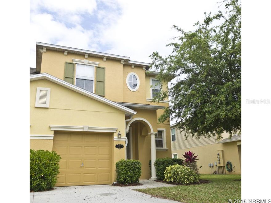 Landings at Sugar Mill-  Perfect one owner townhome just minutes from I-95, beach and shopping. This three bedroom, two and half bath townhouse has an beautiful open floor plan, high ceilings, and a screened-in porch on the east side that keeps afternoons shady and cool. Community pool and walking paths and pond make it a nice walking neighborhood. ;Water: City