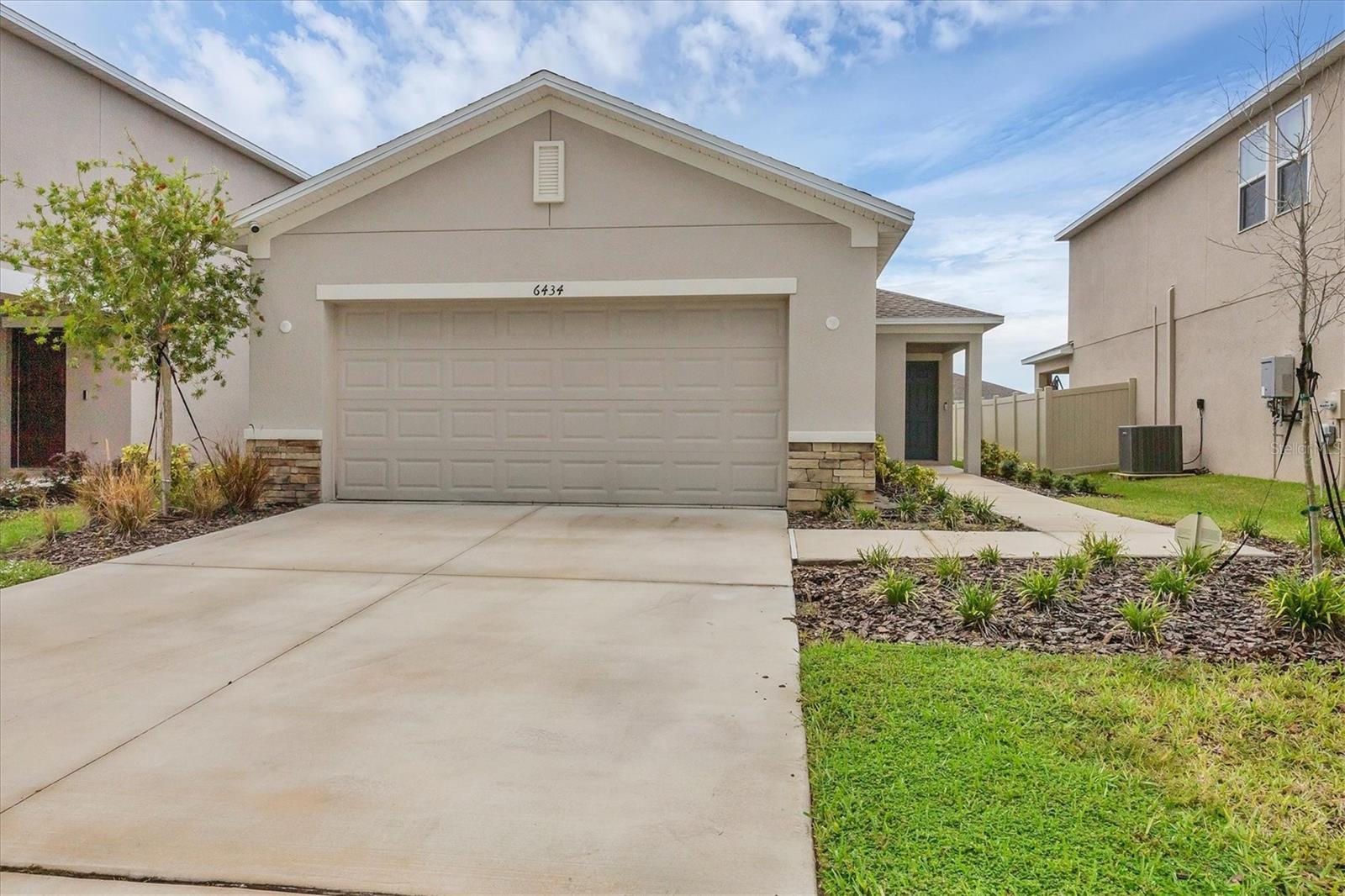 This house was built for a second vacation home. Most of the year, the house was vacant, and the owner barely lived in the house.
Great location with a quiet, nice neighborhood. Don't wait to build! Move in right away! Enjoy modern elegance in this like-new 3 bedroom/2 bath home with 1,453 sq ft of spacious living space. Ceramic tile flooring throughout the main living areas and bathrooms. The kitchen features quartz countertops and stainless-steel appliances. An open floor plan provides plenty of room to entertain while cooking. Lots of windows bring lots of sunshine to brighten every room. Indoor laundry room, 2-car garage with door opener, large backyard with privacy vinyl fence. Community offers pool, clubhouse, fitness center, playground, dog park, and all the amenities you need to make the most of the sunny Florida lifestyle. Just minutes from I-75 and in a growing area, this is an ideal location. More community information at Eaves Bend at Artisan.
