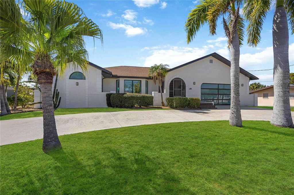 Photo of 105 Sinclair Street SE, Port Charlotte, FL 33952 (MLS # C7521850)