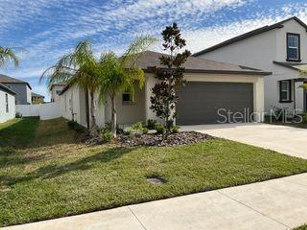 Photo of 110 Rain Lily Avenue, Spring Hill, FL 34609 (MLS # TB8480082)