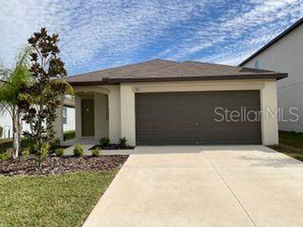 Photo of 110 Rain Lily Avenue, Spring Hill, FL 34609 (MLS # TB8480082)