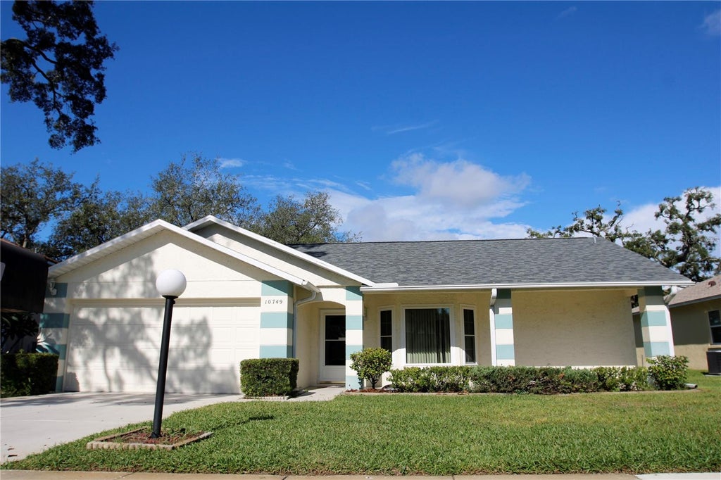 Photo of 10749 Fallen Leaf Lane, Port Richey, FL 34668 (MLS # TB8548385)
