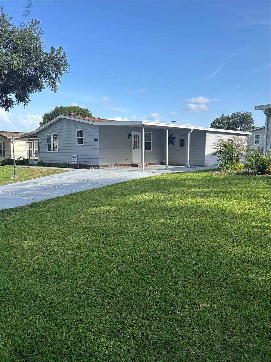 New on the market. Well maintained 2 bedroom, 2 bath, manufactured home on a cul-de-sac street. The location is in the beautiful historic Spanish Springs area - in The Village of Country Club Hills. There is No Bond and No CDD. Beautiful tile floors in main livilng area and laminate flooring in both bedrooms. Stainless appliances including a NEW range, double pane windows, newer blinds and newer A/C. You are a golf cart ride away to Spanish Springs Square for your nightly entertainment, restaurants, shopping, doctors and the hospital. There are many 9 and 18 hole golf courses, pickleball courts, tennis courts, bocce ball courts, softball fields, bowling, pools and many recreation centers for inside activities including pool tables. Be sure to call today to see this home. A must see!