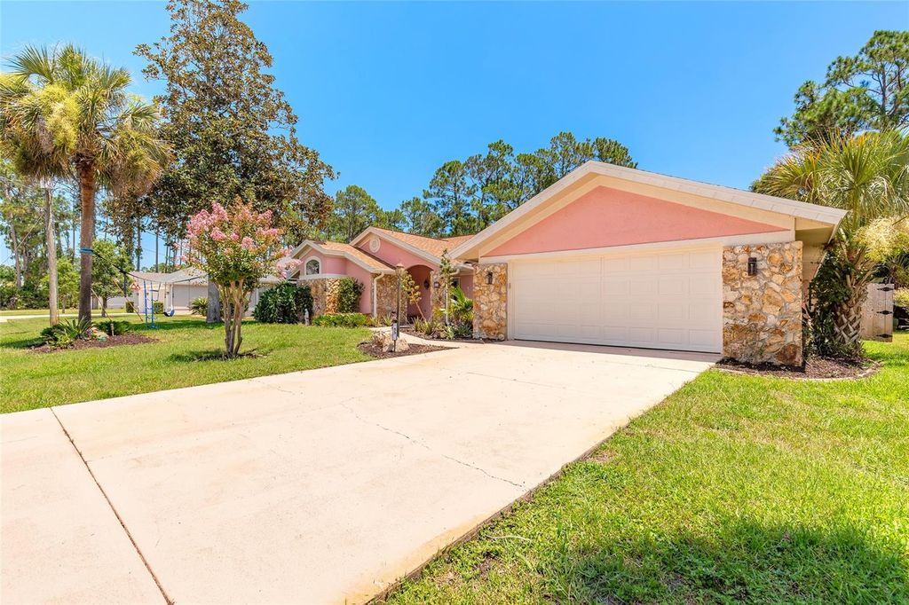 Photo of 53 Lake Success Drive, Palm Coast, FL 32137 (MLS # V4943749)