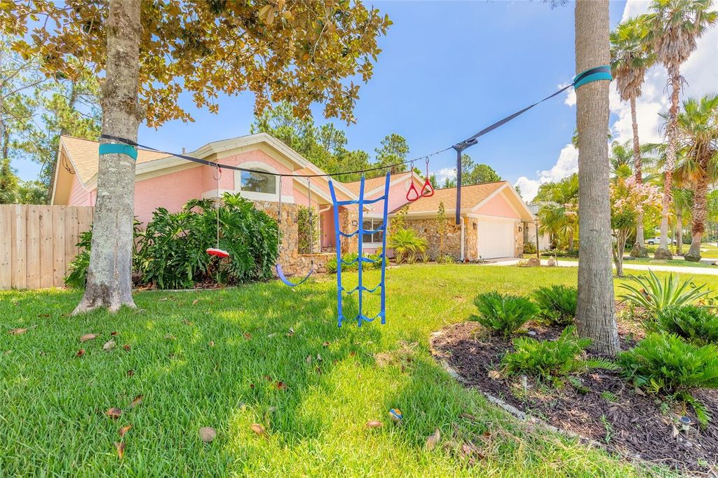 Photo of 53 Lake Success Drive, Palm Coast, FL 32137 (MLS # V4943749)