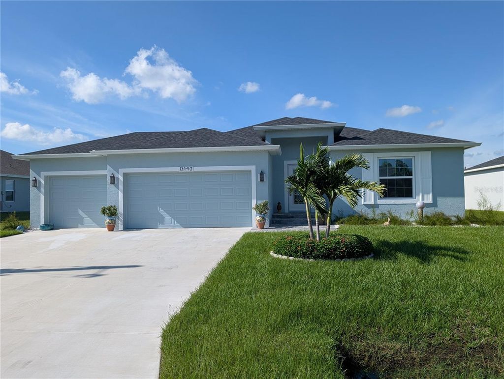 Photo of 12190 Kneeland Terrace, Port Charlotte, FL 33981 (MLS # C7514361)