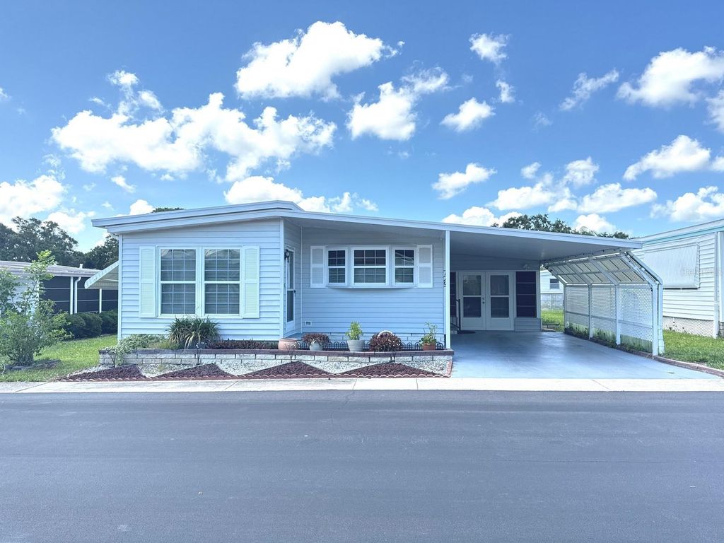 Photo of 725 Sugar Palm Street, Largo, FL 33778 (MLS # TB8400890)