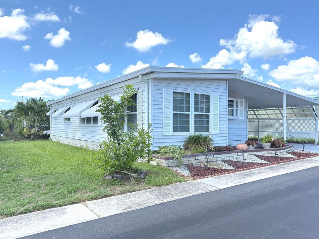 Photo of 725 Sugar Palm Street, Largo, FL 33778 (MLS # TB8400890)