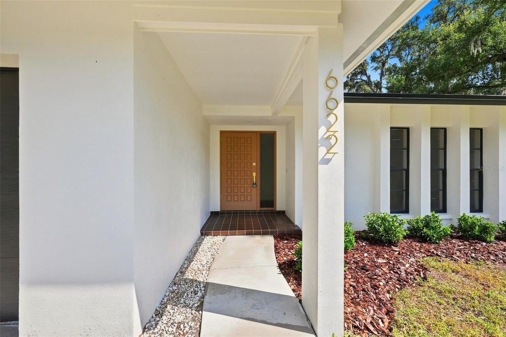 Photo of 6622 Glencoe Drive, Temple Terrace, FL 33617 (MLS # TB8543687)