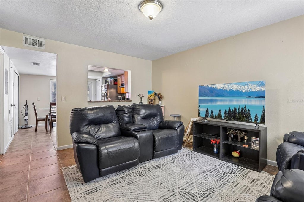 Photo of 12061 Tift Circle, Orlando, FL 32826 (MLS # O6436128)