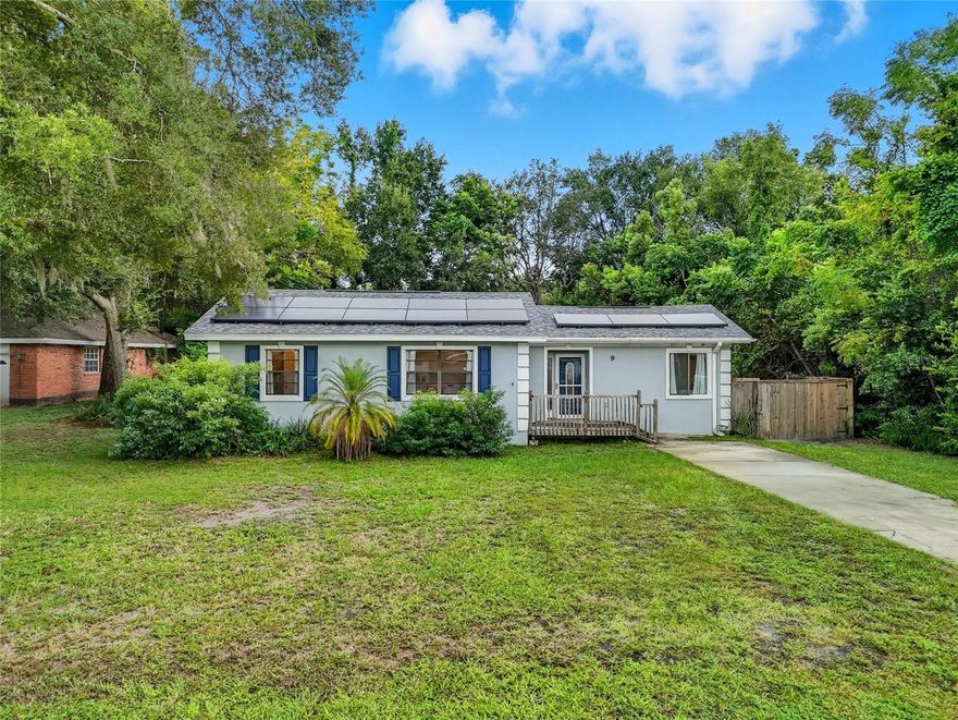 Welcome to 9 Granada Rd, a charming and tranquil home, nestled in nature - that could be yours! DETACHED GARAGE, 2024 AC UNIT AND 2021 ROOF! Perfectly situated on a quarter-acre lot in the heart of the beautiful DeBary! This rare 4-bedroom layout offers plenty of space, natural lighting and a warm, inviting atmosphere. Step inside to find a bright, functional floor plan with plenty of space for the family to enjoy. The kitchen is beautifully done with Corian countertops, a stylish tile backsplash, stainless steel and dark appliances, with a nice view of the backyard- All appliances included! Relax on the front or back porch while enjoying the fully fenced yard, perfect for privacy, pets, and outdoor entertaining. The detached garage provides extra storage and doubles as a workshop. Major updates include a 2024 AC UNIT, 2021 year old roof and a green solar panel system to help keep energy costs low. Conveniently located near highways, the SunRail station, shopping, dining, medical facilities, and just minutes from Volusia County’s beautiful state parks, springs, beaches, and the St. Johns River. Don’t miss your chance to own one of DeBary’s most unique homes, schedule your showing today!