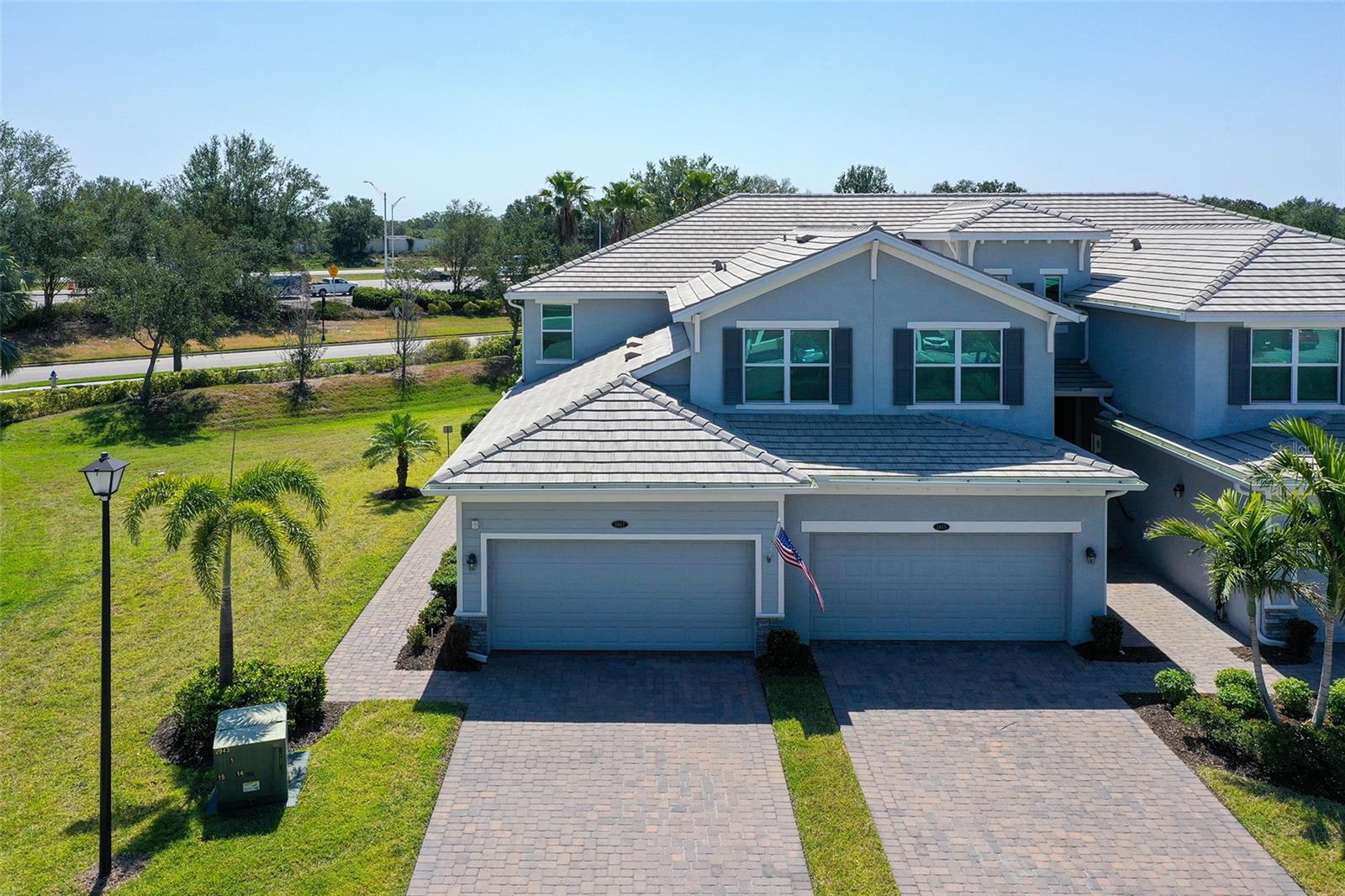 Welcome to Tidewater Preserve, a premier gated waterfront and boating community where Florida living reaches new heights. This impeccably maintained first-floor, end unit Coach Home, built in 2020, offers 3 bedrooms, 2 bathrooms, with boat slip available for rent on a first come basis. Inside, you’ll find an open-concept layout with crown molding, diagonally laid tile flooring throughout, hurricane-rated windows and sliders. The expansive great room flows effortlessly into the chef’s kitchen, which boasts upgraded LG appliances, quartz countertops, a stunning blue glass tile backsplash and island base, modern lighting, and a spacious pantry. The primary suite offers private lanai access, a spacious walk-in closet, and a spa-inspired ensuite with a frameless glass shower, and dual quartz vanities. The large, screened lanai offers over 200 sq ft of private, relaxing outdoor living space, and the side yard adding privacy and makes it perfect for pet lovers. Additional features include a Ring security system, smart thermostat connected to Alexa, two-car garage with storage racks, and a separate laundry room.
Life at Tidewater Preserve means more than just a beautiful home, it’s a vibrant lifestyle. Enjoy access to a resort-style pools, two fitness centers, tennis courts, walking trails along the Manatee River, a dog park, kayak/canoe launch, playground, and multiple clubhouses—all within minutes of I-75 for easy access to beaches, shopping, and dining. Whether you're watching the boats sail by or heading out on the water yourself, this home offers the perfect blend of luxury, comfort, and convenience. Come experience waterfront living at its finest—Tidewater Preserve is ready to welcome your new home