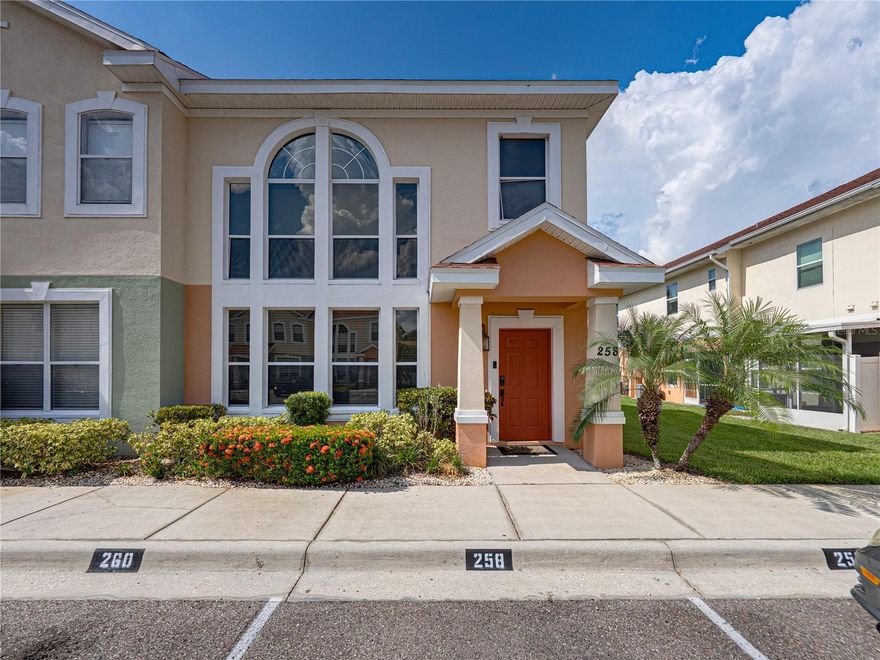 INVESTMENT OPPORTUNITY! Welcome to one of Plant City's premier gated townhome communities! Ideally situated between Lakeland and Tampa, this beautifully maintained end-unit townhouse is a true gem. Soaring 20-foot ceilings and hurricane-tinted windows fill the space with natural light, creating a bright and airy atmosphere. Inside, you’ll find engineered wood flooring, elegant crown molding, and 5-inch baseboards that has a clean, cohesive look throughout. Enjoy serene pond views right from your kitchen’s sliding glass doors an exclusive perk for only a few homes in the neighborhood. Additional highlights include a brand-new AC unit, two reserved parking spaces, and a Lock keyless entry system. Plus the community pool and playground are just steps away. Don’t miss the chance to make this stunning home yours!