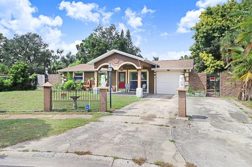 Photo of 6720 Forrestvale Lane, Tampa, FL 33634 (MLS # TB8557101)
