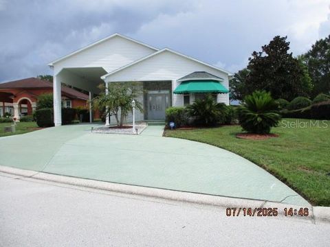 Photo of 1231 Motorcoach Drive, Polk City, FL 33868 (MLS # L4953399)