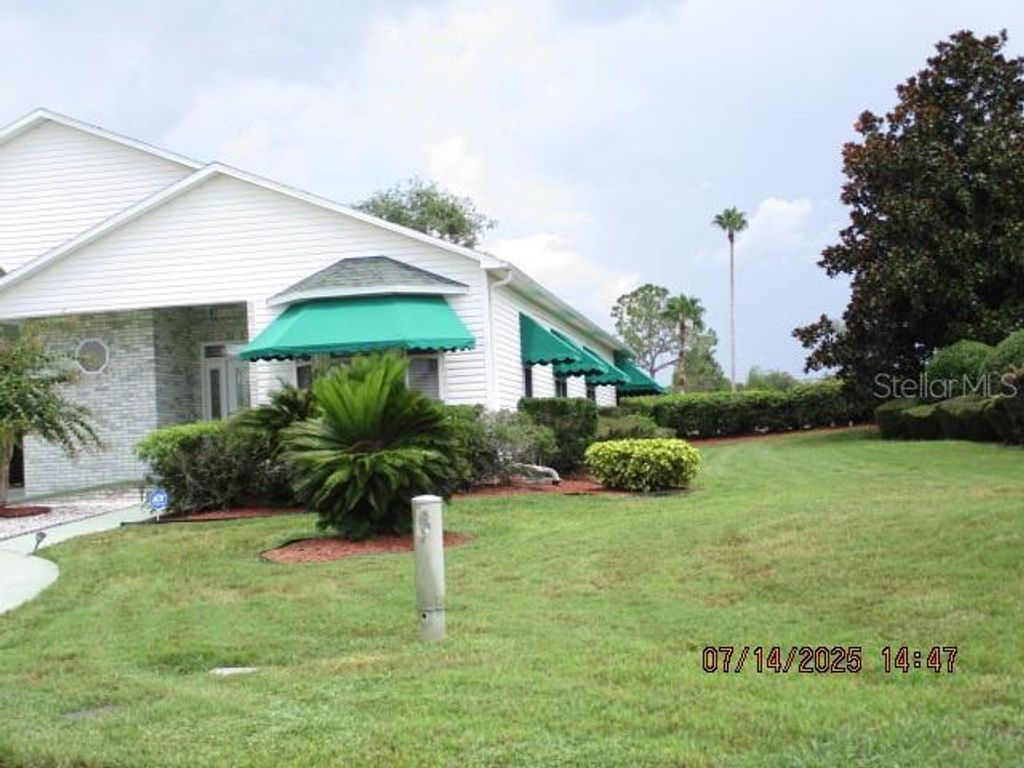 Photo of 1231 Motorcoach Drive, Polk City, FL 33868 (MLS # L4953399)