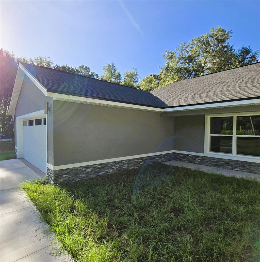 Photo of 2984 SE 140th Lane, Summerfield, FL 34491 (MLS # OM707291)