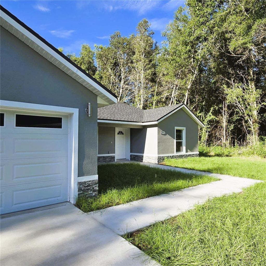 Photo of 2984 SE 140th Lane, Summerfield, FL 34491 (MLS # OM707291)
