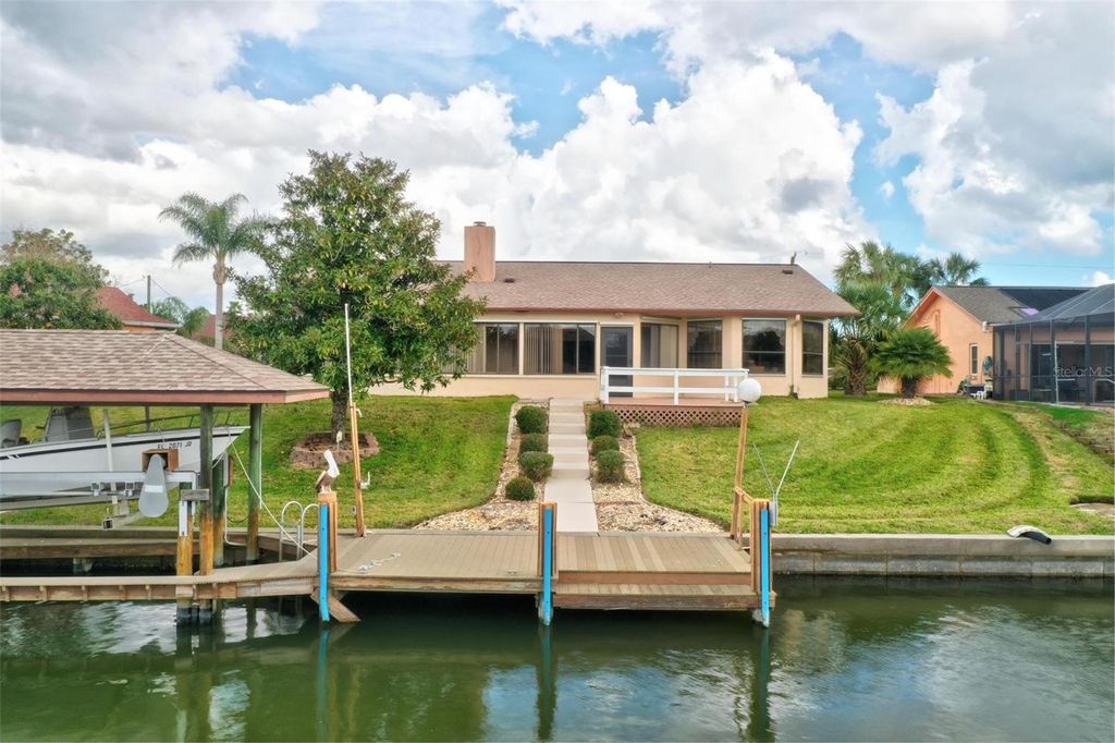 Photo of 25 Cottagegate Court, Palm Coast, FL 32137 (MLS # FC311132)