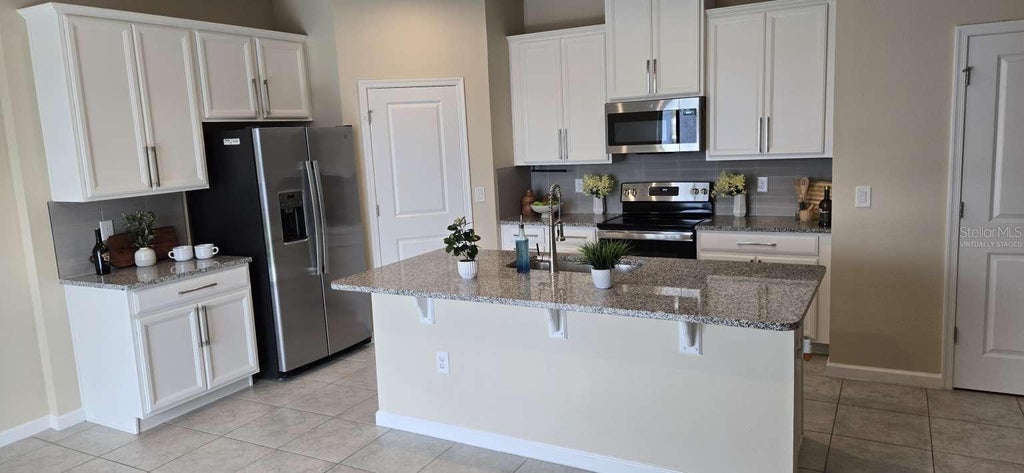 Photo of 1564 Eucalyptus Way, Davenport, FL 33837 (MLS # TB8527533)