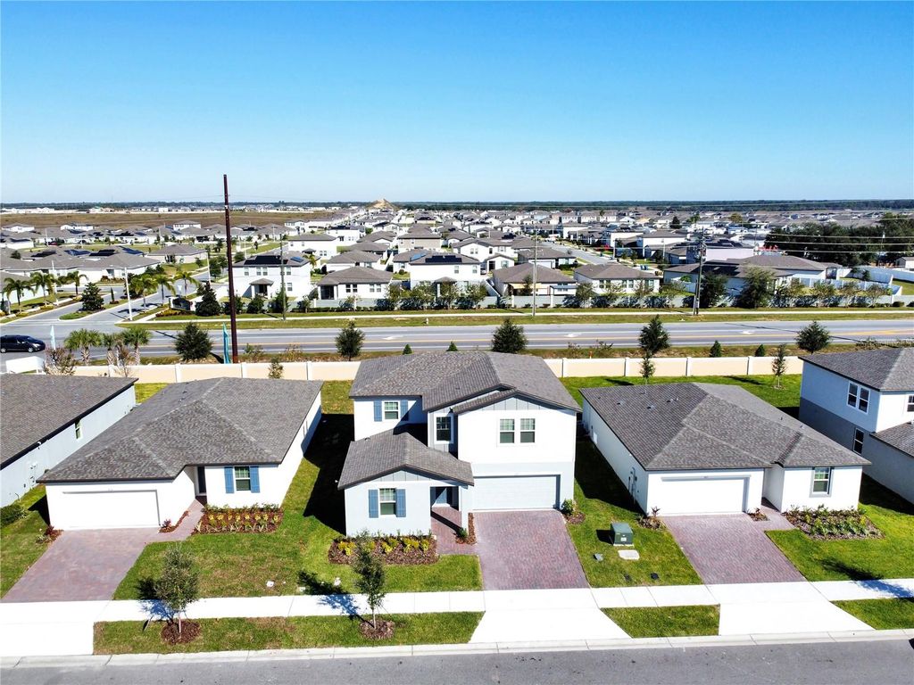 Photo of 879 Sand Sea Place, Haines City, FL 33844 (MLS # P4936935)