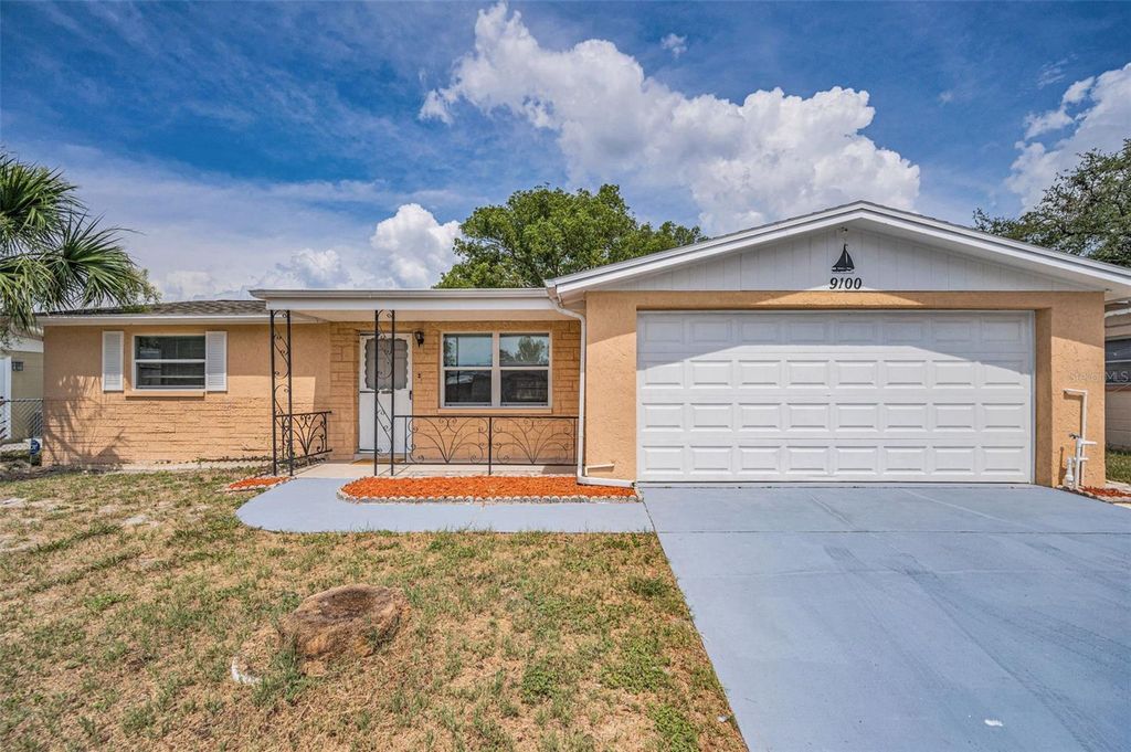 Photo of 9100 Lunar Lane, Port Richey, FL 34668 (MLS # TB8470789)