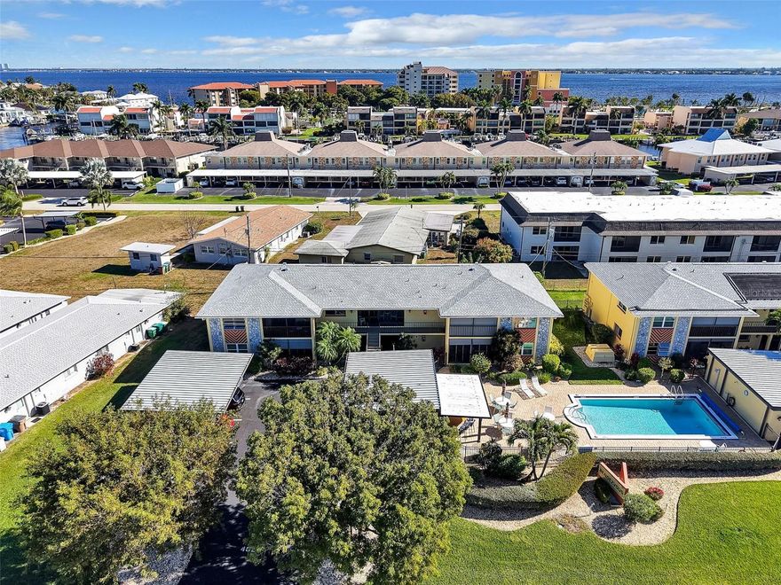 Welcome to Cape Coral, home of over 400 miles of canals, a major boating and waterfront community, and the largest city between Miami and Tampa. You will find numerous parks, restaurants, stores, and water activities. This neighborhood is located on the Caloosahatchee River with Jaycee Riverfront Park getting a makeover to be completed by April. The drive down Beach Parkway is lined with palm trees leading you to the heart of the community at Rendezvous Condos. This second floor condo has access to heated outdoor pool and patio bar with dining area. Includes 1 parking space and 4 parking spaces available for quests. Condo has been updated, marble tile wall in kitchen, quartz counter tops, new tile flooring, stainless appliances. Two bedrooms and two bathrooms. Enclosed balcony.