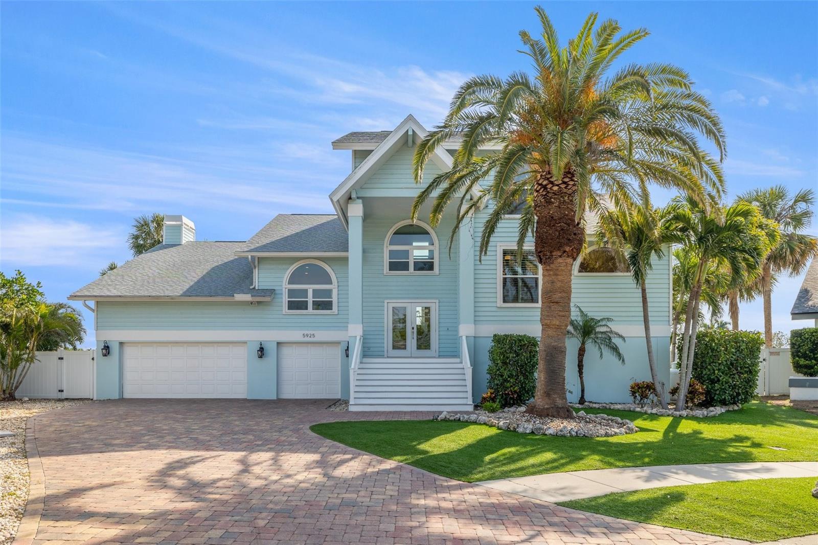 Welcome to Seabird Drive in the Pasadena Yacht & Country Club. This 4 bedroom, 3 bathroom waterfront home offers the perfect blend of coastal elegance, modern comfort and peace of mind with NO KNOWN STORM FLOOD HISTORY. With a separate office space, and a versatile bonus room on the first floor that opens directly to the pool, this home is designed for both comfort and entertaining. The screened-in back deck provides the perfect spot to unwind while enjoying breathtaking waterfront views. Inside, the home offers the convenience of two laundry rooms and coastal modern finishes throughout. Just a short walk to the restaurants and shops of downtown Gulfport and only minutes from St. Pete Beach and downtown St. Petersburg. This home is located in a cul-de-sac and offers a 6 car garage, 2020 roof, impact windows and doors, two AC units installed in 2022 (air oasis: whole home air purification system within both units), 2016 water heater, a composite dock featuring a 14,000 lb. boat lift (lift installed 2024), a private putting green and newly installed composite decking on both the front and back of the house(2024).